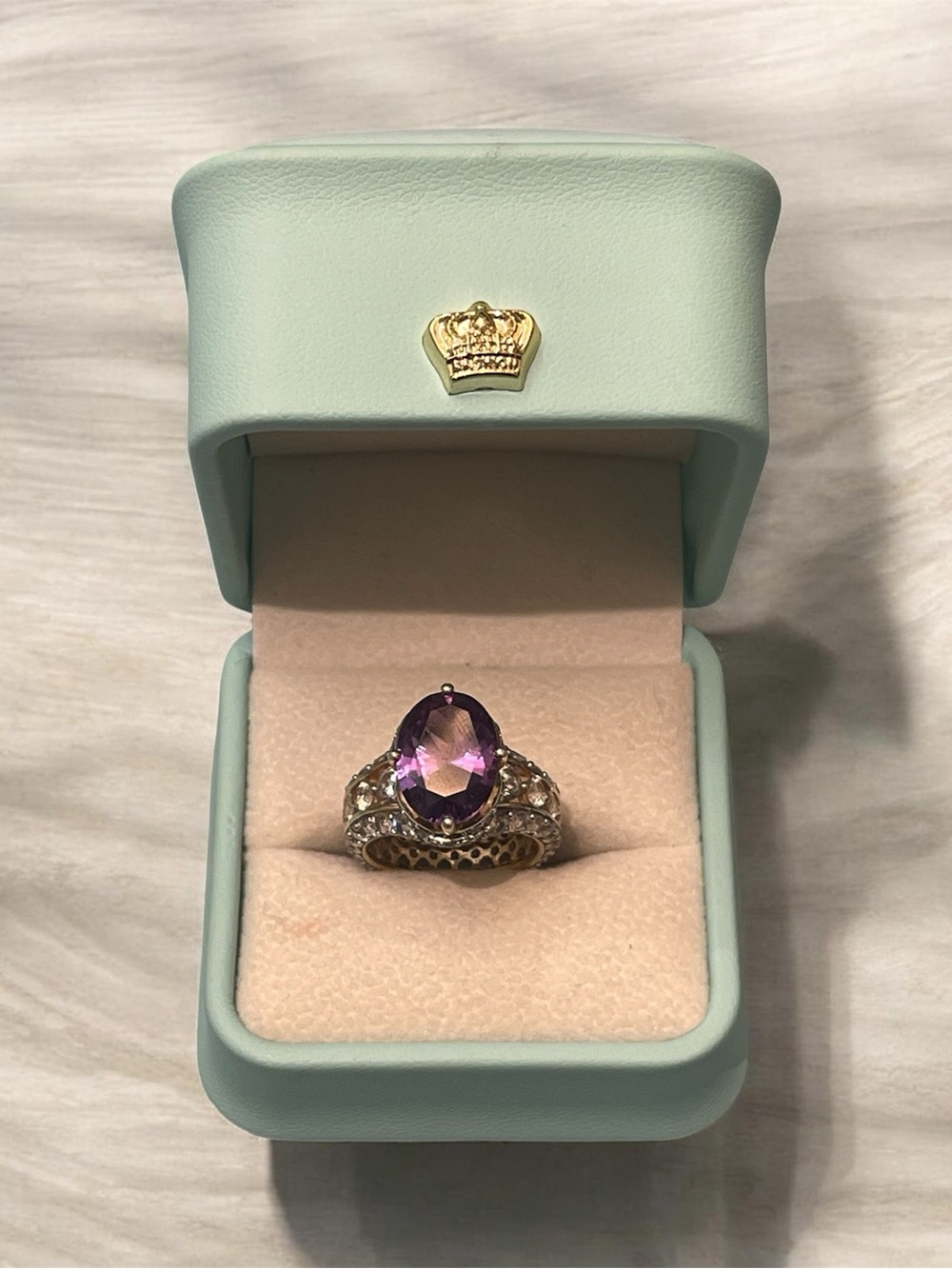Elegant sterling silver Tanzanite and sapphire Halo Ring